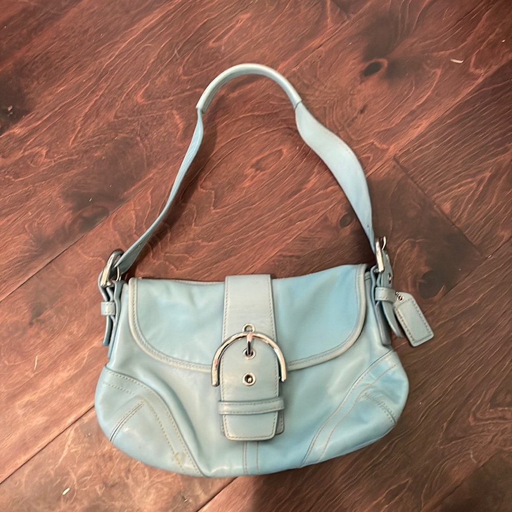 Super cute vintage light blue coach purse.